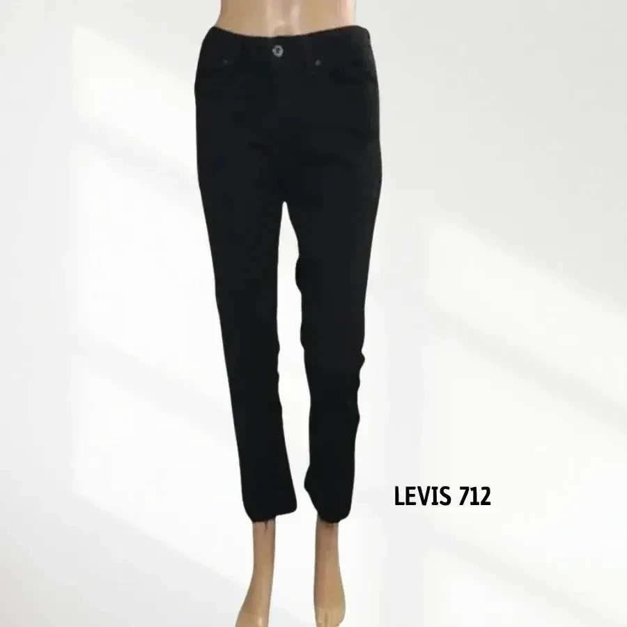 LEVI'S 712 -  slim bas éffiloché d'origine - taille basse - stretch - noir intense - trés bon état -